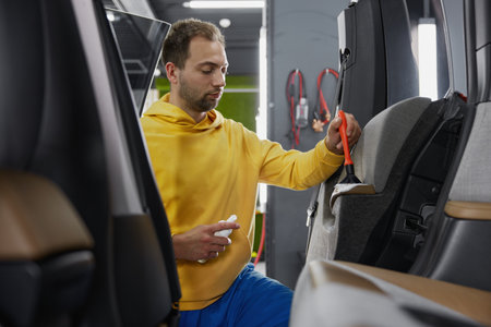 Male master working at car wash serviceの写真素材