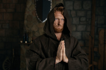 Portrait of blessed priest praying having faith believe in Godの写真素材
