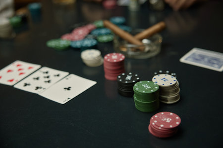 Poker night an evening filled with chips, cards, cigars around the Tableの写真素材