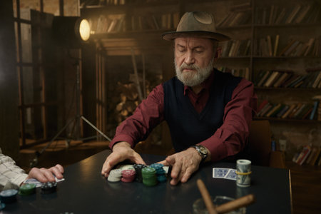 An elderly man engaged in a game of poker in a warm, rustic setting filled with cozy atmosphere