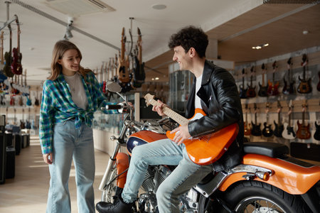 A group of young musicians are hanging out in a vibrant guitar store alongside a motorbike