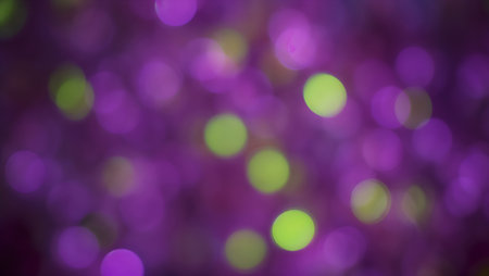 Abstract circular bokeh background of Christmaslight. Purple and greenの素材