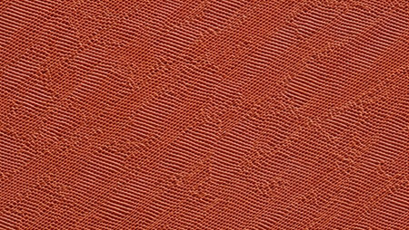 Close-up of textured red leather background. High resolution photo.の素材