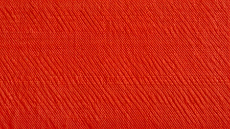 Red fabric texture background. Close up of red fabric texture background.の素材