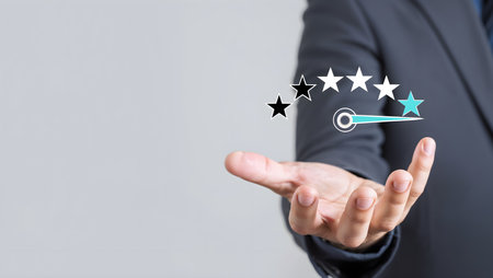 Businessman pointing at 5 star rating on virtual screen with copy spaceの素材