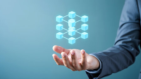 Close up of businesswoman hand holding cube figure as symbol of innovationの素材