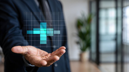 Businessman hand holding cross icon on virtual screen. Business and technology concept.の素材