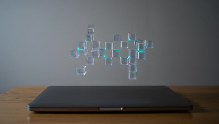 Laptop and cube icon on the wooden table. 3d renderingの素材