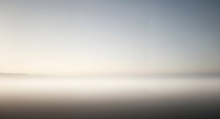 Mountain range in mist with gradient fade effect landscape. Ethereal mountain backdrop texture. Serene nature scene with soft light for web design and print.の素材