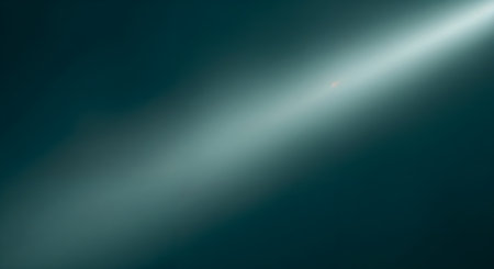 Abstract of sunbeam on dark blue background. Shallow depth of field.の素材