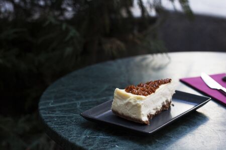 cheesecake and coffee on marble tableの写真素材
