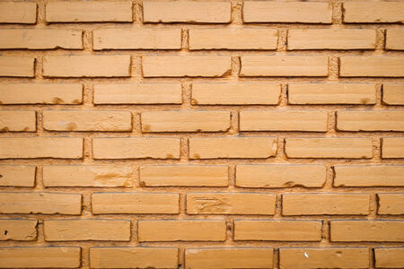 Orange brick wall background の写真素材