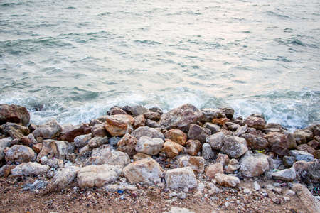 Sea rock and wave の写真素材