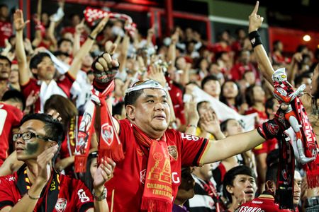 BANGKOK,THAILAND-MA Y 4  Fan club of SCG Muangthong United during the TPL 2014 between SCG Muangthong United and Suphanburi FC at SCG Stadium on May 4, 2014 in Bangkok,Thailand のeditorial素材