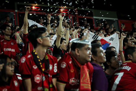 BANGKOK,THAILAND-MA Y 4  Fan club of SCG Muangthong United during the TPL 2014 between SCG Muangthong United and Suphanburi FC at SCG Stadium on May 4, 2014 in Bangkok,Thailand のeditorial素材