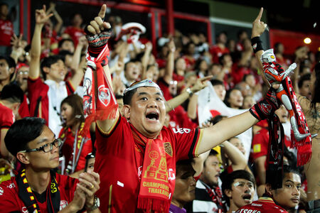 BANGKOK,THAILAND-MA Y 4  Fan club of SCG Muangthong United during the TPL 2014 between SCG Muangthong United and Suphanburi FC at SCG Stadium on May 4, 2014 in Bangkok,Thailand のeditorial素材