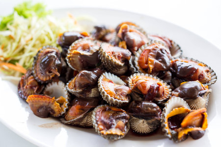 Grilled cockle in Thai seafood style の写真素材