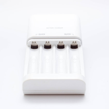 Battery charger in white background の写真素材