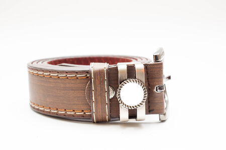Leather belt in white background.の写真素材