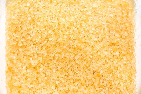 Brown sugar close up background.の写真素材