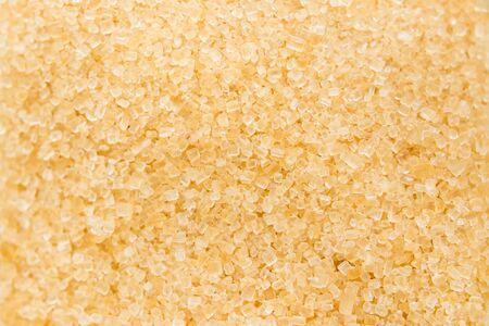 Brown sugar close up background.の写真素材
