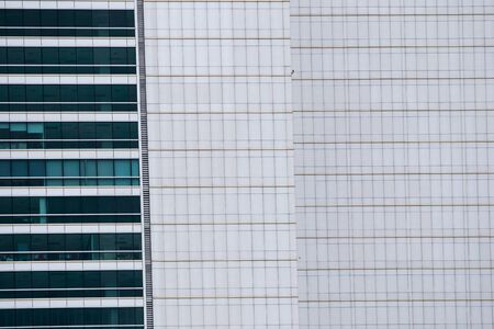 Windows at high modern building close up in Bangkok Thailand.の写真素材