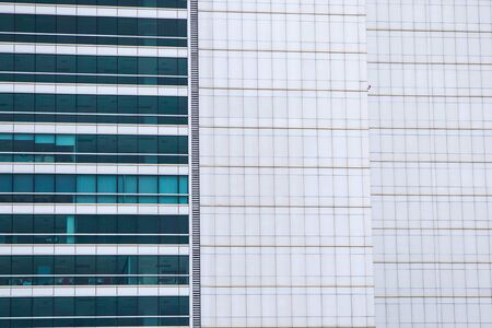 Windows at high modern building close up in Bangkok Thailand.の写真素材