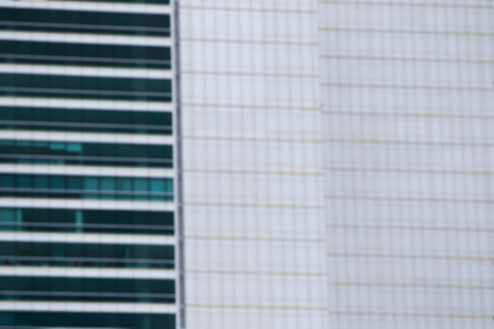 Blur image of windows at high modern building close up in Bangkok Thailand.の写真素材