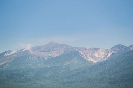 Landscape of mountain  and forest in Hokkaido Japan during the summer.の写真素材