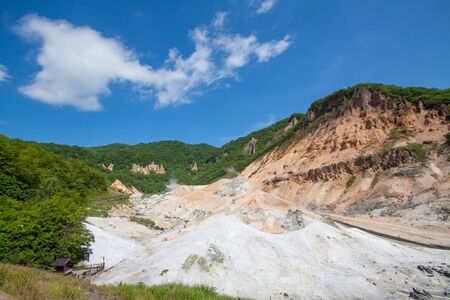 Landscape of hot mud pool in Jikogudani Hokkaido Japan.の写真素材