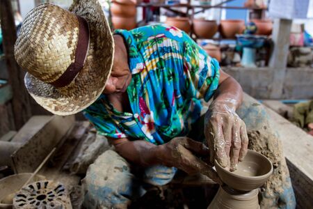 NONTHABURI,THAILAND-AUG 9: The traditional clay pot making in Koh Kred island by the professional clay pot maker taken on Aug 9, 2015のeditorial素材