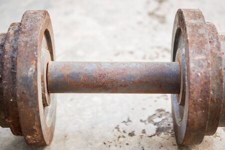 Old rusty dumbells close up.の写真素材