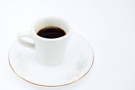 Black coffee in small coffe mug isolated.の写真素材