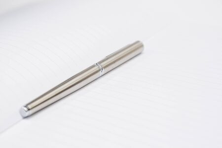 Notebook and pen close up.の写真素材