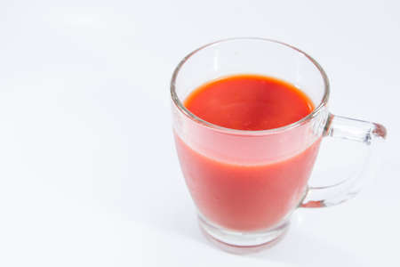 Image of fresh tomato juice close up isolated.の写真素材