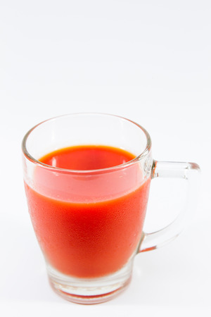 Image of fresh tomato juice close up isolated.の写真素材