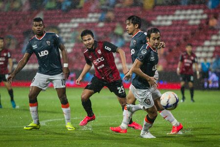NONTHABURI,THAILAND-SEPTEMBER 23: Thitiapan Puangjan(No.25) Players of SCG Muangthong United in action between the game MTUTD and Chaing Rai UTD in Chang FA Cup 2015 at SCG Stadium on Sep 23, 2015のeditorial素材