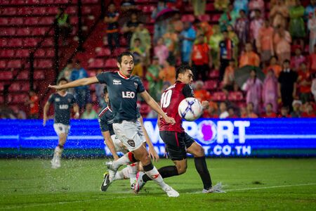 NONTHABURI,THAILAND-SEPTEMBER 23: Unidentified Players of SCG Muangthong United in action between the game MTUTD and Chaing Rai UTD in Chang FA Cup 2015 at SCG Stadium on Sep 23, 2015のeditorial素材