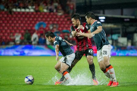 NONTHABURI,THAILAND-SEPTEMBER 23: Chananan Pombuppha(No.22) Players of SCG Muangthong United in action between the game MTUTD and Chaing Rai UTD in Chang FA Cup 2015 at SCG Stadium on Sep 23, 2015のeditorial素材