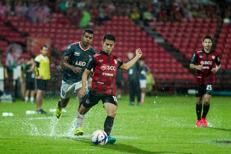 NONTHABURI,THAILAND-SEPTEMBER 23: Sarach Yuyen(No.16) Players of SCG Muangthong United in action between the game MTUTD and Chaing Rai UTD in Chang FA Cup 2015 at SCG Stadium on Sep 23, 2015のeditorial素材
