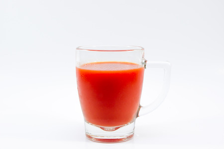 Image of fresh tomato juice close up isolated.の写真素材