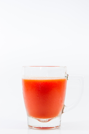Image of fresh tomato juice close up isolated.の写真素材