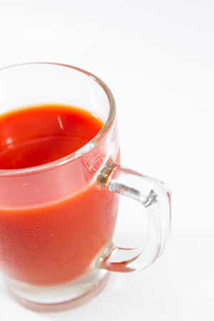 Image of fresh tomato juice close up isolated.の写真素材