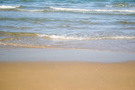 Small sea wave close up background.の写真素材
