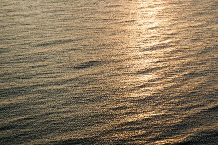 Beautiful sun rise a long the ocean background.の写真素材