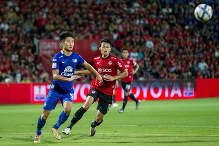 NONTHABURI,THAILAND-MAY1: Adisak Kraisorn (No.11) Player of SCG Mueng Thong UTD in action between the game MTUTD VS Chonburi FC on May 1,2016.のeditorial素材