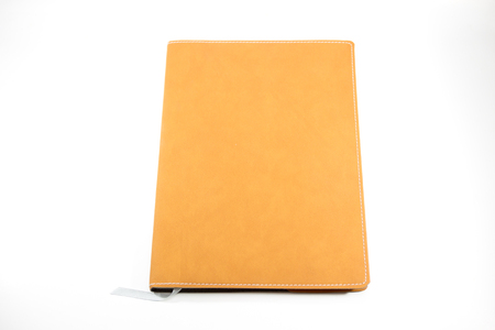 Classic leather notebook isolated in white background.の写真素材