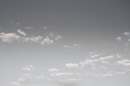 Small cloud group in clear sky background.(Processed in monochrome colour tone)の写真素材