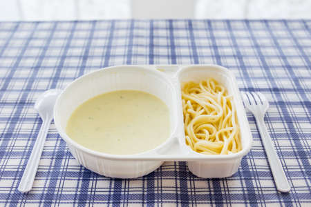 Spaghetti carbonara in box close up.の写真素材
