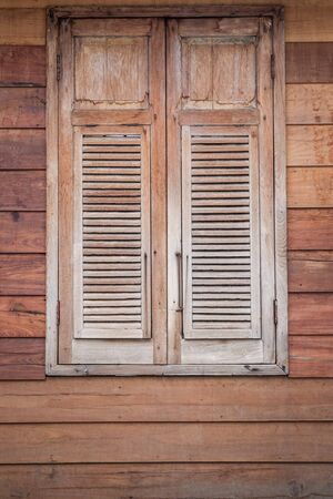 Closed old wooden windows style background.の写真素材